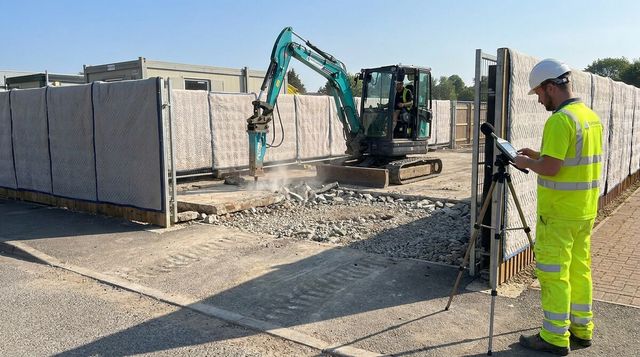 Noise monitoring at the boundary of a UK civil engineering site while a screened excavator breaks out concrete
